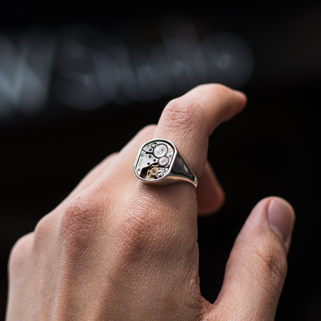 Vintage silver ring on a finger