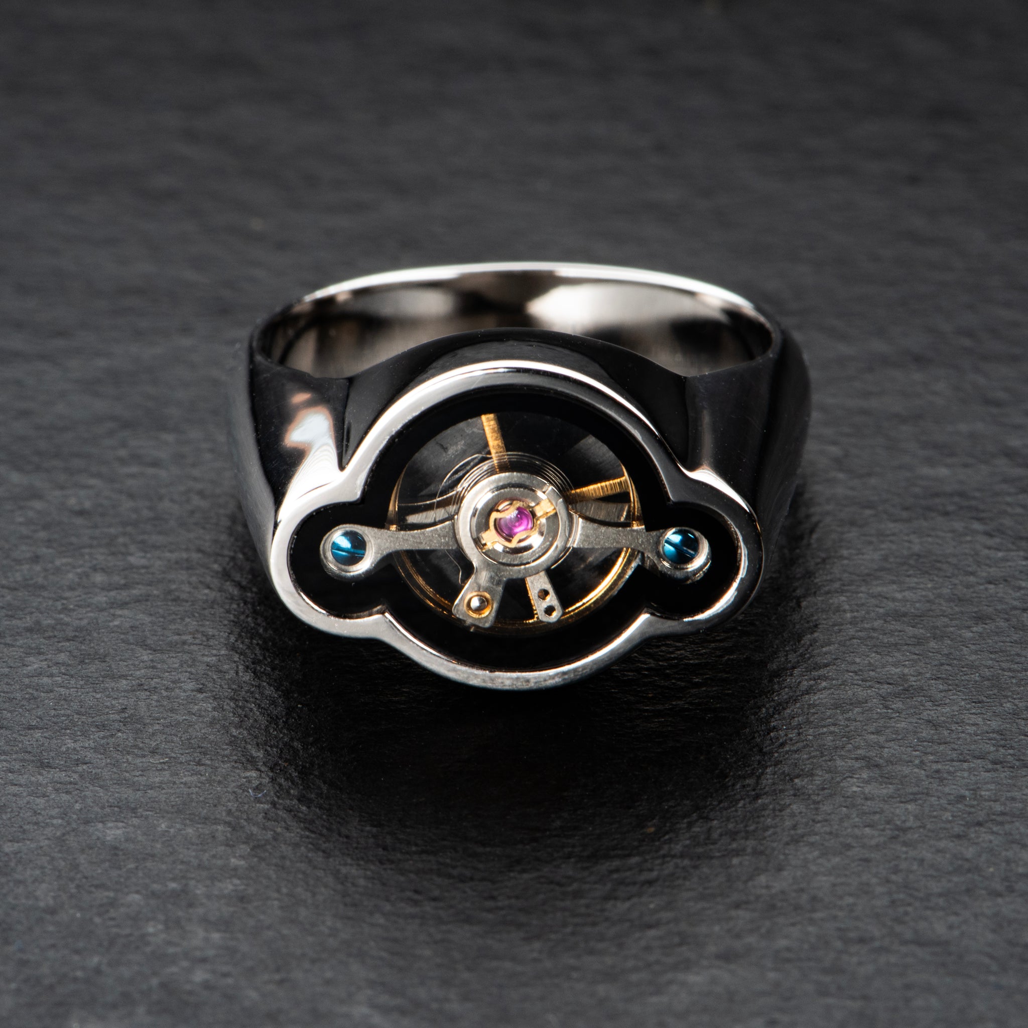 Regulator ring with rotating kinetic balance wheel