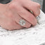 vintage round silver ring on a finger