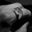 vintage rectangle ring with australian opal on a finger