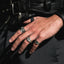 pinky signet ring on finger